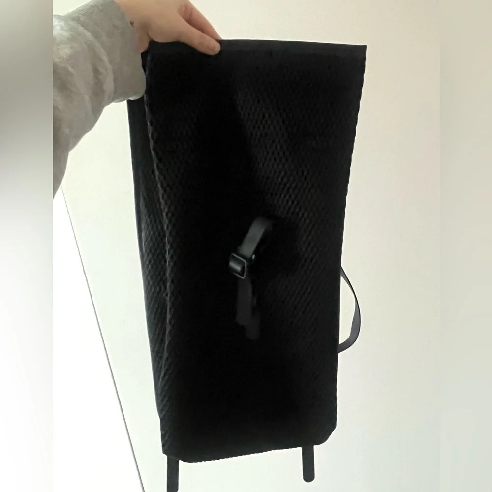 Rains Black Mesh Roll top Backpack